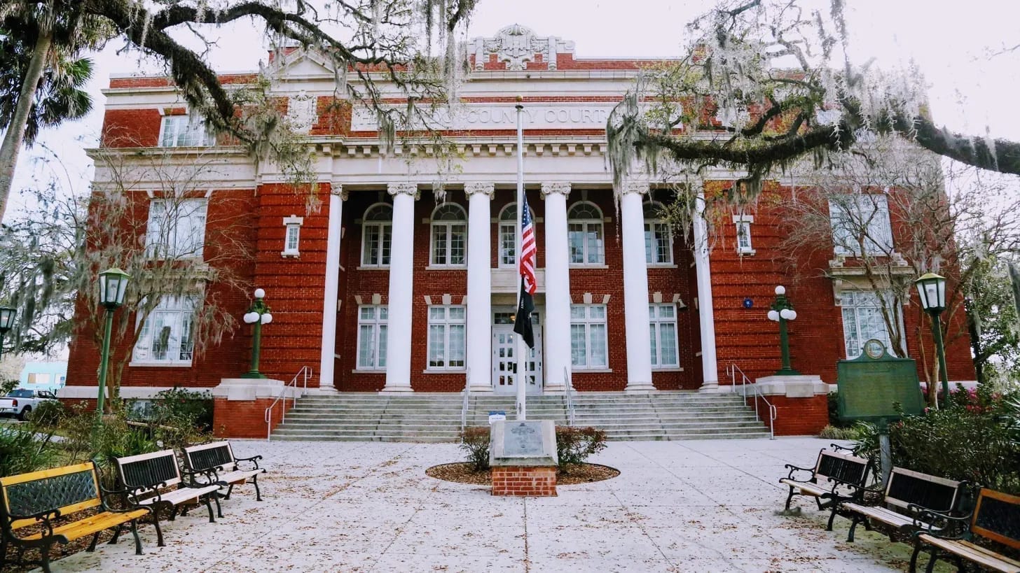 Hernando County Courthouse with Spanish moss and overcast sky